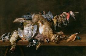 Still life of dead birds and a hare on a table