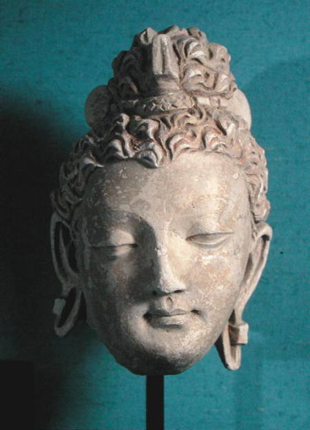 Head of a Smiling Buddha, Greco-Buddhist style, from Hadda from Afghan School