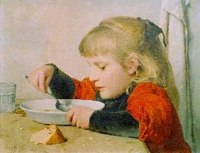 Girl eating soup