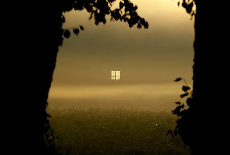 a window in morning mist