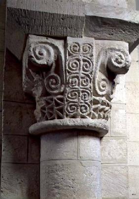 Carved column decorated with croziers and spirals