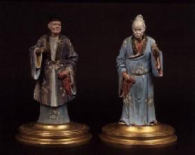 Pair of chinese terracotta figures, one male, one female,with nodding heads