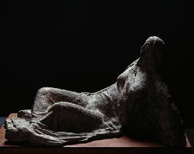 Female figure reclining, in terracotta