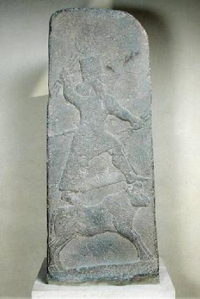 Stele depicting the storm-god Adad standing on his bull and brandishing lightning bolts, from the Te