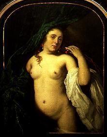 Portrait of a young woman at a curtain