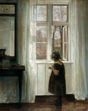 Little girl at a window