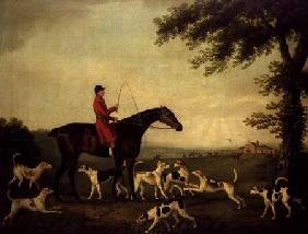Huntsman with Hounds in a Landscape