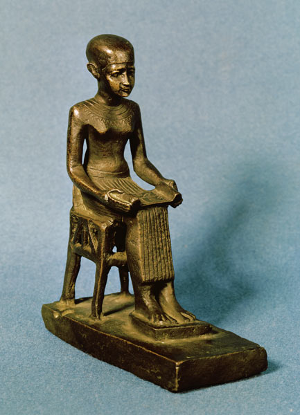 Seated statue of Imhotep (fl.c.2980 BC) holding an open papyrus scroll, Late Period from Egyptian