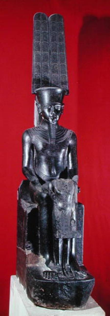 Seated statue of the god Amon protecting Tutankhamun, New Kingdom from Egyptian