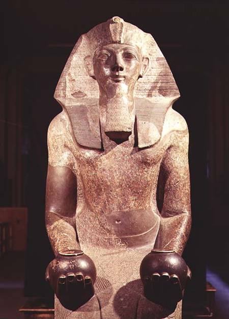 Statue of Queen Makare Hatshepsut (1503-1482 BC) holding two vases containing offerings of wine and from Egyptian