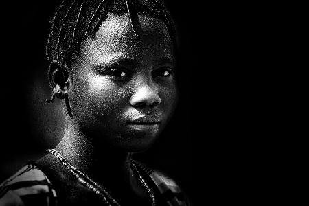 an intense gaze (cotton collector woman, Benin)