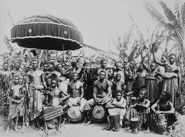 Ashantee King Carried by Slaves under State Umbrella Surrounded by Followers, c.1890 (b/w photo) from English School, (19th century)