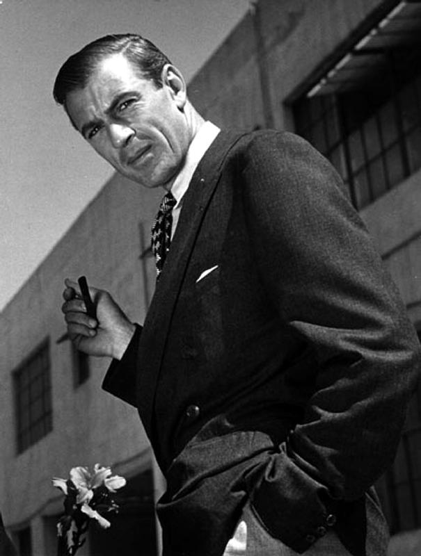 American Actor Gary Cooper smoking a pipe from English Photographer, (20th century)