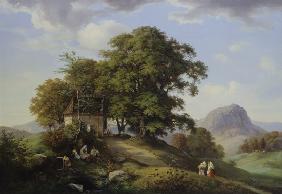 Mountainous landscape with cluster of trees and chapel in the background of the boron