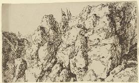 Zerklüftete Felswand, vorne rechts eine am Hang sitzende Gewandfigur