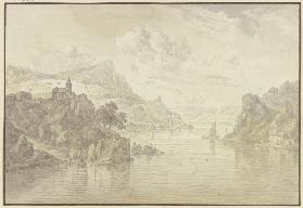 Blick in ein Flusstal mit felsigen Ufern, links auf einem Felsen eine Kirche