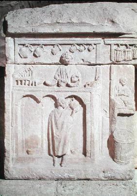Relief depicting a wine merchant