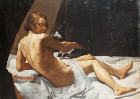 Young Man Lying on a Bed with a Cat