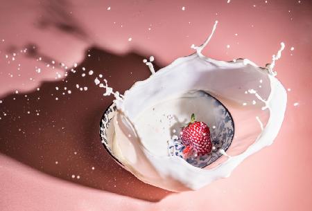 Strawberry fall into the milk trap
