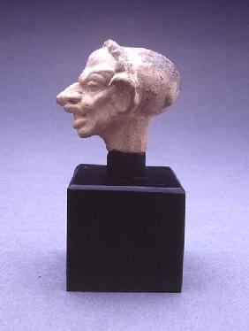 Grotesque head of a woman