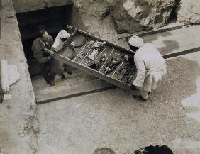 A tray of chariot parts being removed from the Tomb of Tutankhamun, Valley of the Kings, 1922 (gelat