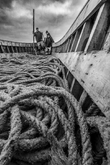 Fishermen, ropes, boats