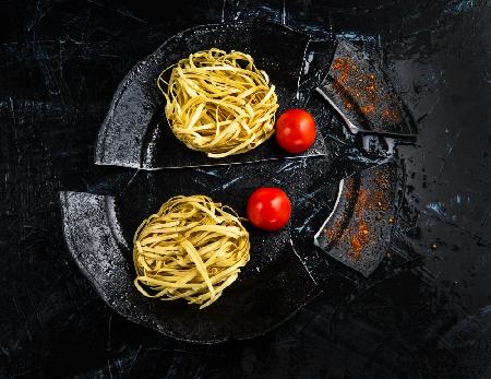Italian pasta on a broken plate