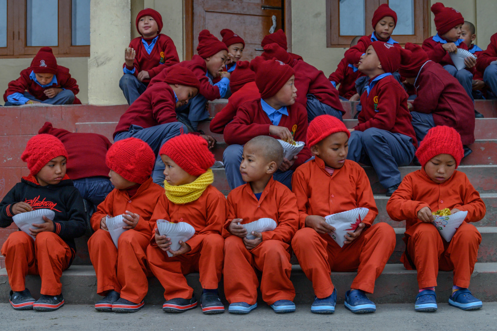 young monks in lunch time india from Ilana Lam