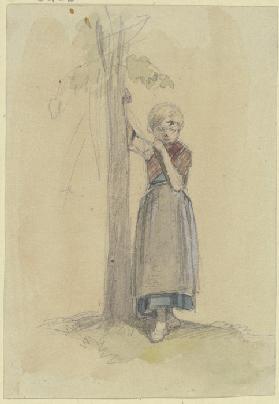 Kleines Mädchen, mit der rechten Hand sich an einen Baum lehnend, in nachdenklicher Haltung