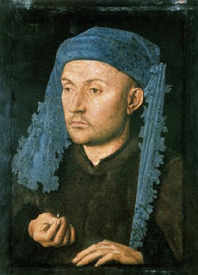 Portrait of a man with a blue headgear