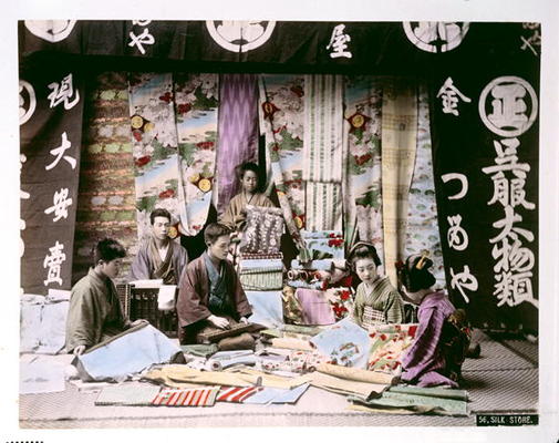 Japanese Silk and Fabric Shop, c.1900 (hand coloured photo) from Japanese School, (20th century)