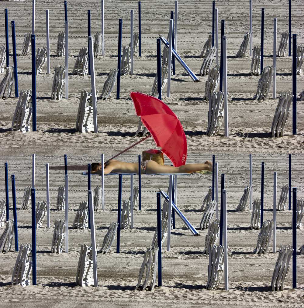 Composition of poles and chairs with red umbrella from Jois Domont