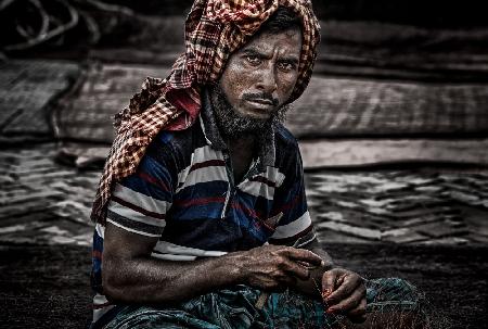 Sewing fishing nets - Bangladesh