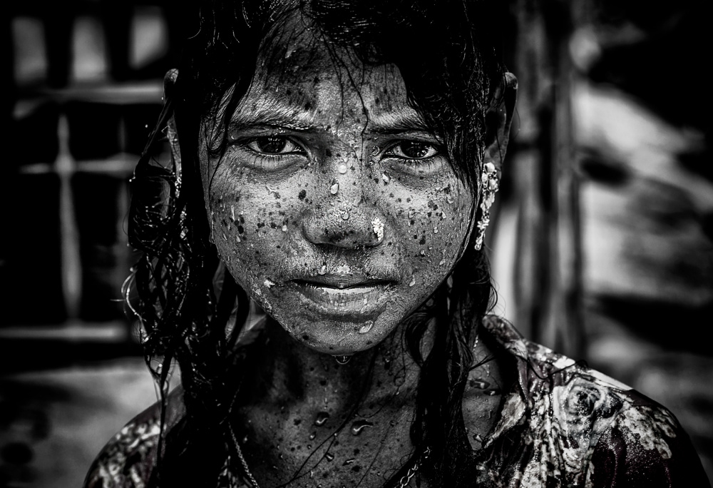Rohingya refugee girl cooling off from the heat - Bangladesh from Joxe Inazio Kuesta Garmendia