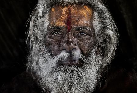 Sadhu expelling the smoke through the nose - Prayagraj - India