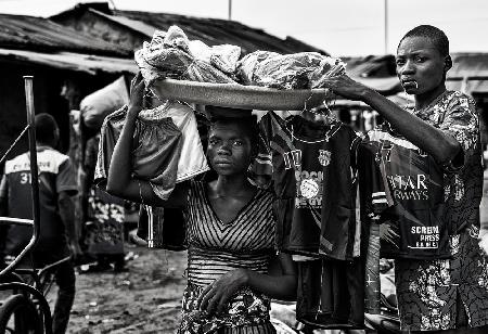 Selling goods in a market - Benin