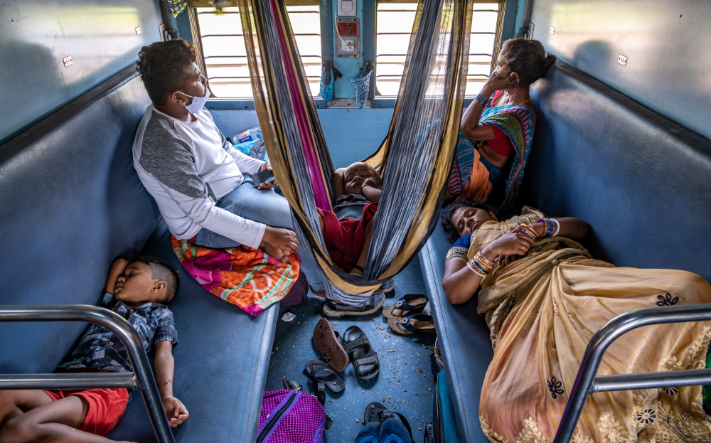 An Indian family travelling by train from Md Sabbir