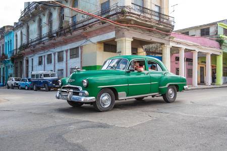 Green Oldtimer in Havana, Cuba. Street in Havanna, Kuba.
