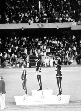1968 Olympic Games. Mexiko City. Mens 200 m. TOMMIE SMITH, USA, Gold, and J. CARLOS, Bronze, in Blac