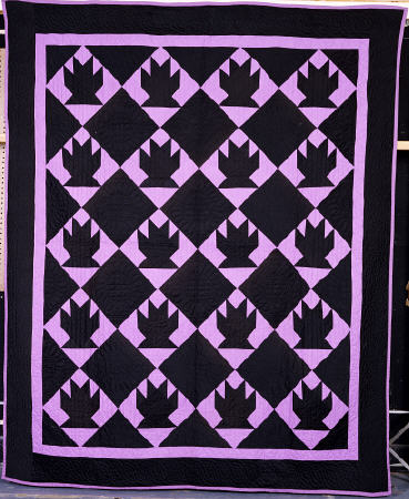 An Amish Pieced & Quilted Cotton Coverlet Worked In 20 Blocks Of Basket Pattern from 