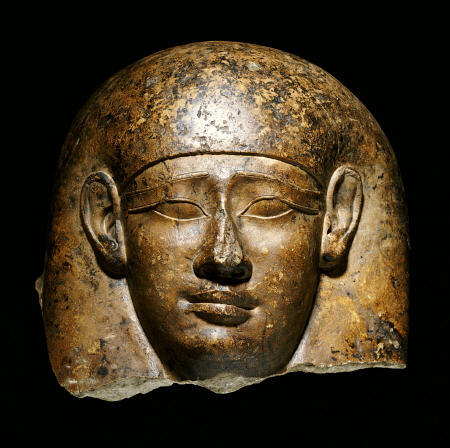 An Over Life-Size Limestone Head From An Anthropoid Sarcophagus from 