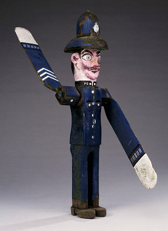 A Polychrome Wood And Metal Whirligig Modelled As A Police Sergeant, 20th Century from 