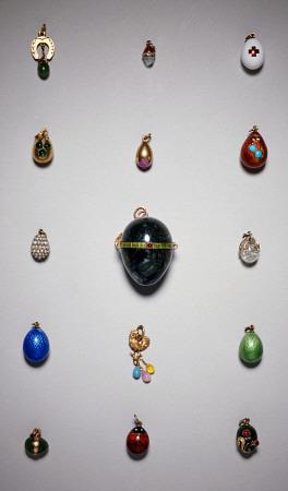 A Collection Of Russian Miniature Eggs, Pill Box And Pendants, Some Faberge