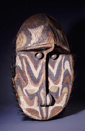 A Large Iatmul Woven Rattan Gable Mask, Of Oval Form With Projecting Forehead