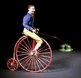 A Rare Clockwork  ''Blondin'' Cyclist -Painted Lead Figure,