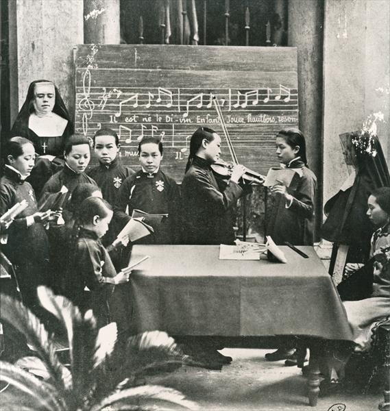 Carol practice in a French mission in China, early twentieth century (b/w photo)  from 