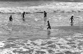 Children playing in sea, Somnath (b/w photo) 