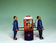 `Mandarin'in a Chinese sedan chair, a Lehmann clockwork toy, German (tinplate)
