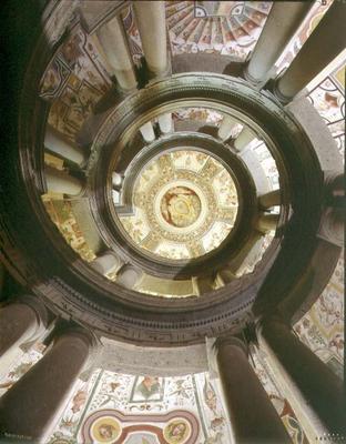 View of the stone spiral staircase looking up towards the ceiling, designed by Jacopo Vignola (1505- from 