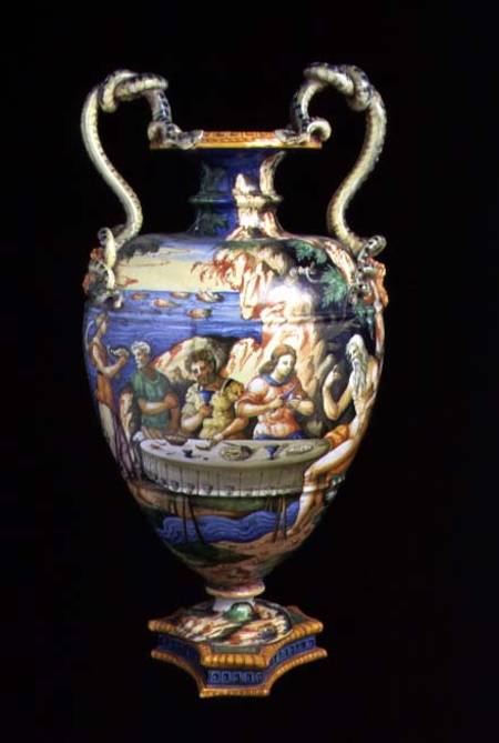 Maiolica urn with two handles in the shape of serpents, the body decorated with an al fresco banquet from Orazio Fontana of Urbino